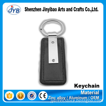 2016 China cheap design black rubber keychain OEM welcome